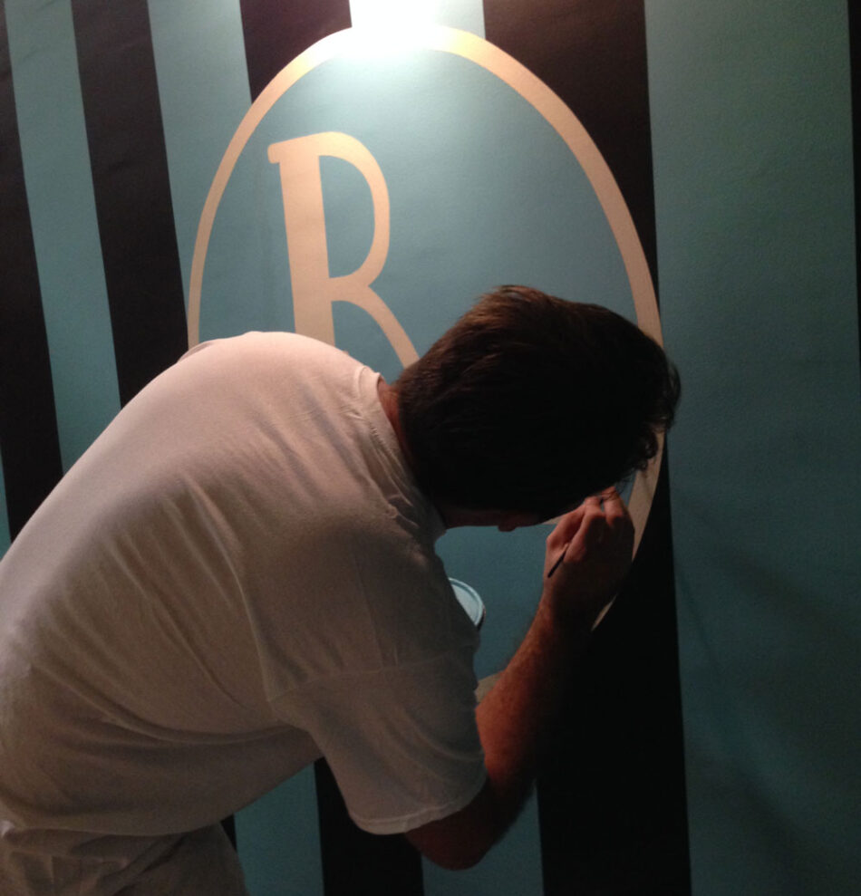 Aaron Leszczynski hand painting a sign for Revive Consignment in Somerville, NJ. Aaron Leszczynski hand painting a sign for Revive Consignment in Somerville, NJ.